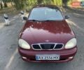 Красный Дэу Ланос, объемом двигателя 1.6 л и пробегом 161 тыс. км за 3300 $, фото 2 на Automoto.ua