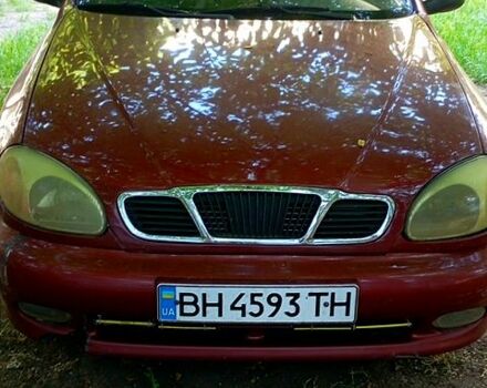 Красный Дэу Ланос, объемом двигателя 1.5 л и пробегом 161 тыс. км за 1300 $, фото 5 на Automoto.ua