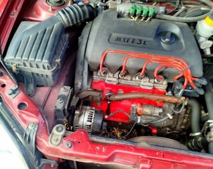 Красный Дэу Ланос, объемом двигателя 1.4 л и пробегом 180 тыс. км за 2400 $, фото 3 на Automoto.ua