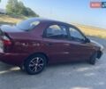 Красный Дэу Ланос, объемом двигателя 1.6 л и пробегом 161 тыс. км за 3300 $, фото 8 на Automoto.ua