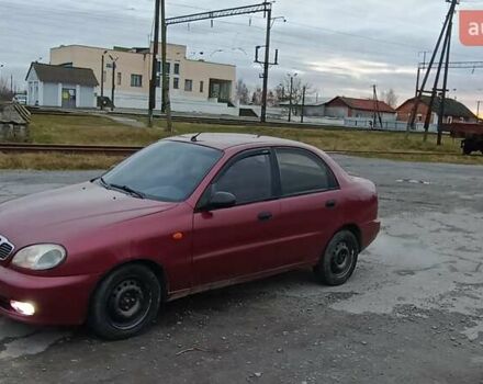 Красный Дэу Ланос, объемом двигателя 1.5 л и пробегом 245 тыс. км за 1650 $, фото 3 на Automoto.ua
