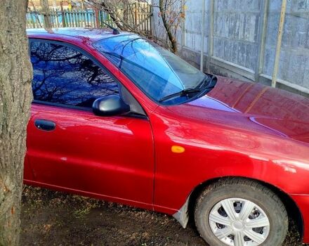 Красный Дэу Ланос, объемом двигателя 1.4 л и пробегом 180 тыс. км за 2400 $, фото 5 на Automoto.ua