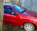 Красный Дэу Ланос, объемом двигателя 1.4 л и пробегом 180 тыс. км за 2400 $, фото 5 на Automoto.ua