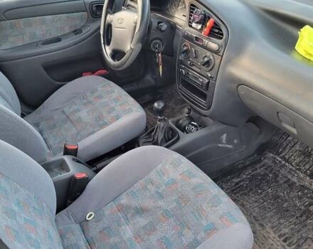 Червоний Деу Ланос, об'ємом двигуна 1.5 л та пробігом 470 тис. км за 1500 $, фото 4 на Automoto.ua