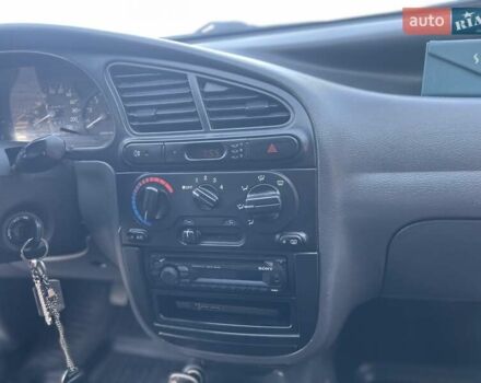 Красный Дэу Ланос, объемом двигателя 1.6 л и пробегом 161 тыс. км за 3300 $, фото 17 на Automoto.ua