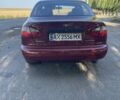 Красный Дэу Ланос, объемом двигателя 1.6 л и пробегом 161 тыс. км за 3300 $, фото 1 на Automoto.ua