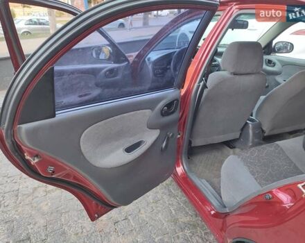 Красный Дэу Ланос, объемом двигателя 1.5 л и пробегом 218 тыс. км за 2900 $, фото 19 на Automoto.ua
