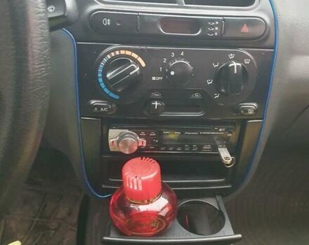 Красный Дэу Ланос, объемом двигателя 1.5 л и пробегом 226 тыс. км за 2400 $, фото 16 на Automoto.ua