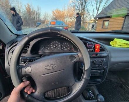 Червоний Деу Ланос, об'ємом двигуна 1.5 л та пробігом 470 тис. км за 1500 $, фото 3 на Automoto.ua