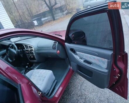 Красный Дэу Ланос, объемом двигателя 1.6 л и пробегом 244 тыс. км за 2850 $, фото 6 на Automoto.ua