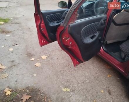 Червоний Деу Ланос, об'ємом двигуна 1.5 л та пробігом 230 тис. км за 1800 $, фото 12 на Automoto.ua