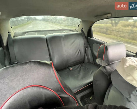 Красный Дэу Ланос, объемом двигателя 1.5 л и пробегом 658 тыс. км за 1500 $, фото 11 на Automoto.ua