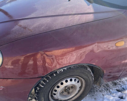 Красный Дэу Ланос, объемом двигателя 1.5 л и пробегом 230 тыс. км за 2100 $, фото 2 на Automoto.ua