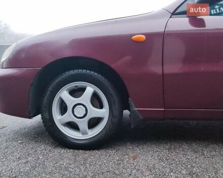 Красный Дэу Ланос, объемом двигателя 1.6 л и пробегом 244 тыс. км за 2850 $, фото 7 на Automoto.ua