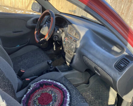 Красный Дэу Ланос, объемом двигателя 1.5 л и пробегом 230 тыс. км за 2100 $, фото 8 на Automoto.ua