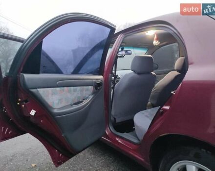 Красный Дэу Ланос, объемом двигателя 1.6 л и пробегом 244 тыс. км за 2850 $, фото 2 на Automoto.ua