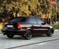 Красный Дэу Ланос, объемом двигателя 1.5 л и пробегом 150 тыс. км за 3300 $, фото 5 на Automoto.ua