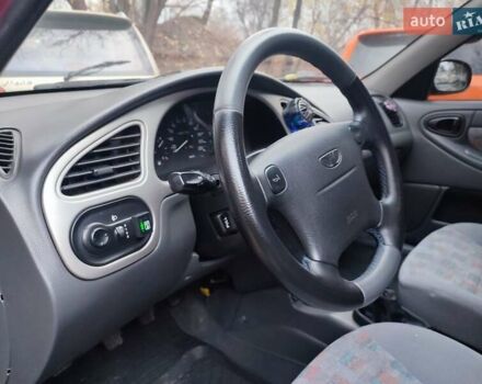 Красный Дэу Ланос, объемом двигателя 1.6 л и пробегом 244 тыс. км за 2850 $, фото 12 на Automoto.ua