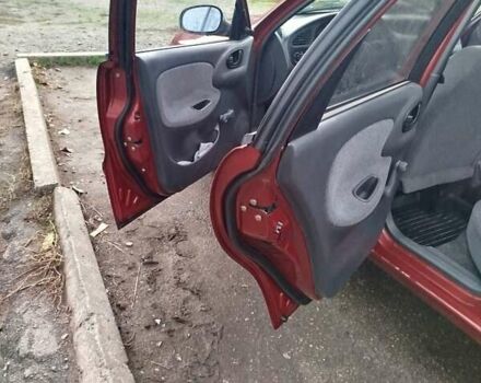 Красный Дэу Ланос, объемом двигателя 1.5 л и пробегом 216 тыс. км за 2500 $, фото 12 на Automoto.ua