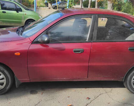 Красный Дэу Ланос, объемом двигателя 1.5 л и пробегом 180 тыс. км за 2300 $, фото 1 на Automoto.ua