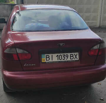 Красный Дэу Ланос, объемом двигателя 1.5 л и пробегом 180 тыс. км за 2300 $, фото 4 на Automoto.ua