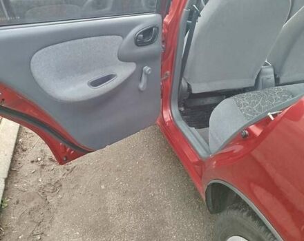 Красный Дэу Ланос, объемом двигателя 1.5 л и пробегом 216 тыс. км за 2500 $, фото 14 на Automoto.ua