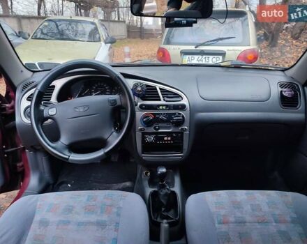 Красный Дэу Ланос, объемом двигателя 1.6 л и пробегом 244 тыс. км за 2850 $, фото 15 на Automoto.ua