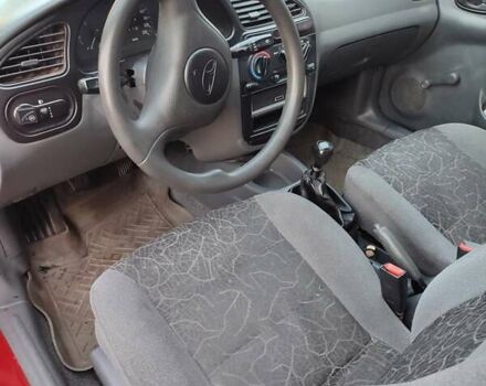 Красный Дэу Ланос, объемом двигателя 1.5 л и пробегом 218 тыс. км за 2900 $, фото 21 на Automoto.ua