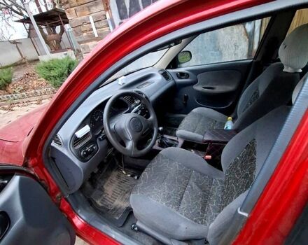 Червоний Деу Ланос, об'ємом двигуна 1.5 л та пробігом 266 тис. км за 1800 $, фото 3 на Automoto.ua