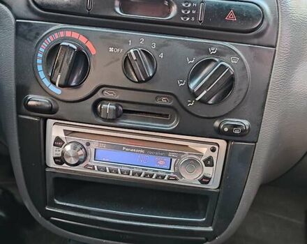 Красный Дэу Ланос, объемом двигателя 1.5 л и пробегом 218 тыс. км за 2900 $, фото 26 на Automoto.ua