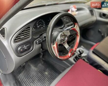 Червоний Деу Ланос, об'ємом двигуна 1.3 л та пробігом 128 тис. км за 1800 $, фото 7 на Automoto.ua