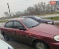 Красный Дэу Ланос, объемом двигателя 1.5 л и пробегом 245 тыс. км за 1100 $, фото 1 на Automoto.ua