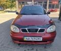 Красный Дэу Ланос, объемом двигателя 1.5 л и пробегом 220 тыс. км за 2200 $, фото 1 на Automoto.ua