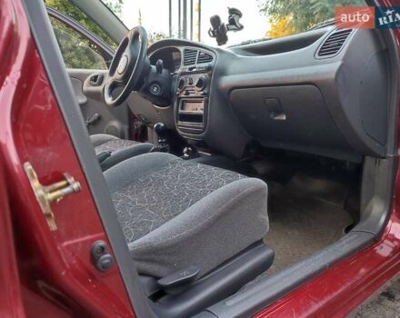 Красный Дэу Ланос, объемом двигателя 1.5 л и пробегом 218 тыс. км за 2900 $, фото 9 на Automoto.ua