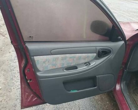 Красный Дэу Ланос, объемом двигателя 1.5 л и пробегом 226 тыс. км за 2400 $, фото 12 на Automoto.ua