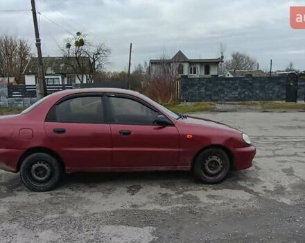 Красный Дэу Ланос, объемом двигателя 1.5 л и пробегом 245 тыс. км за 1650 $, фото 10 на Automoto.ua