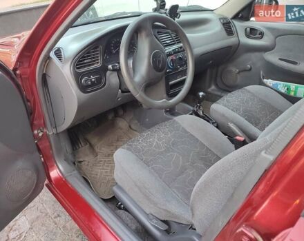Красный Дэу Ланос, объемом двигателя 1.5 л и пробегом 218 тыс. км за 2900 $, фото 22 на Automoto.ua