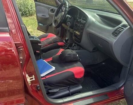 Красный Дэу Ланос, объемом двигателя 1.5 л и пробегом 59 тыс. км за 3750 $, фото 6 на Automoto.ua