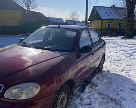 Красный Дэу Ланос, объемом двигателя 1.5 л и пробегом 230 тыс. км за 2100 $, фото 1 на Automoto.ua