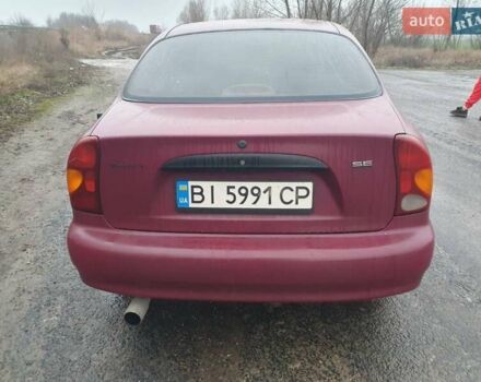 Красный Дэу Ланос, объемом двигателя 1.5 л и пробегом 226 тыс. км за 2400 $, фото 6 на Automoto.ua