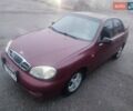 Красный Дэу Ланос, объемом двигателя 1.6 л и пробегом 244 тыс. км за 2850 $, фото 1 на Automoto.ua