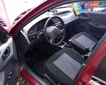 Красный Дэу Ланос, объемом двигателя 1.3 л и пробегом 265 тыс. км за 2200 $, фото 8 на Automoto.ua