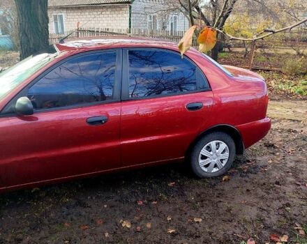 Красный Дэу Ланос, объемом двигателя 1.4 л и пробегом 180 тыс. км за 2400 $, фото 6 на Automoto.ua