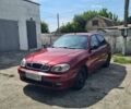 Красный Дэу Ланос, объемом двигателя 1.5 л и пробегом 285 тыс. км за 1500 $, фото 1 на Automoto.ua