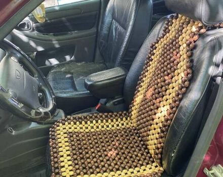 Красный Дэу Ланос, объемом двигателя 1.6 л и пробегом 222 тыс. км за 2660 $, фото 6 на Automoto.ua