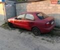 Красный Дэу Ланос, объемом двигателя 1.5 л и пробегом 250 тыс. км за 850 $, фото 1 на Automoto.ua