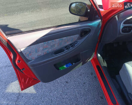 Красный Дэу Ланос, объемом двигателя 1.6 л и пробегом 187 тыс. км за 3150 $, фото 10 на Automoto.ua