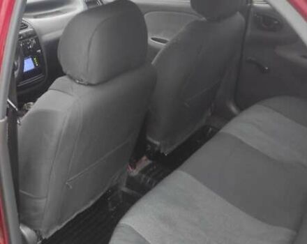 Красный Дэу Ланос, объемом двигателя 1.5 л и пробегом 260 тыс. км за 2500 $, фото 8 на Automoto.ua