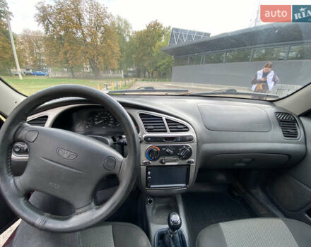 Красный Дэу Ланос, объемом двигателя 1.6 л и пробегом 210 тыс. км за 2000 $, фото 2 на Automoto.ua