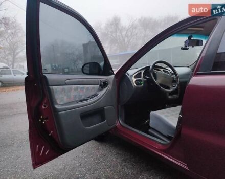 Красный Дэу Ланос, объемом двигателя 1.6 л и пробегом 244 тыс. км за 2850 $, фото 4 на Automoto.ua